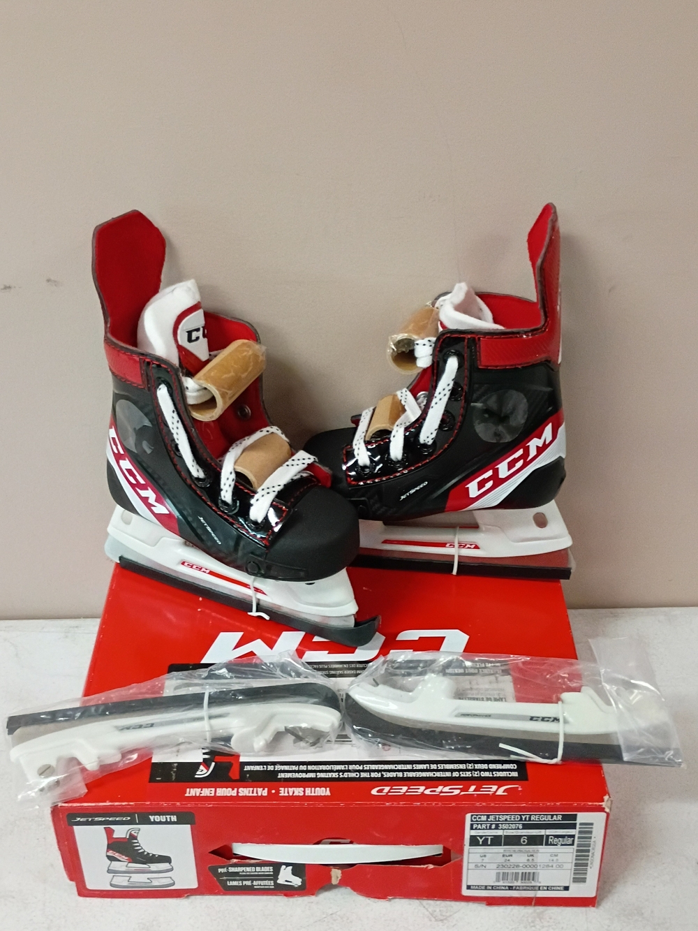 CCM Kids Red, Black and White Ice Hockey Skates